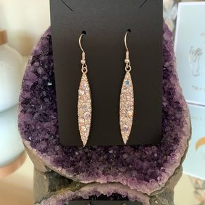 Silver earrings with holo gems